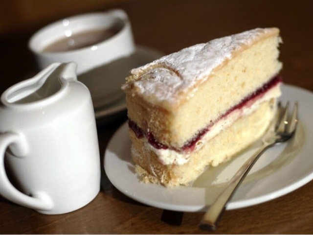 Homemade Victoria sponge and pot of tea